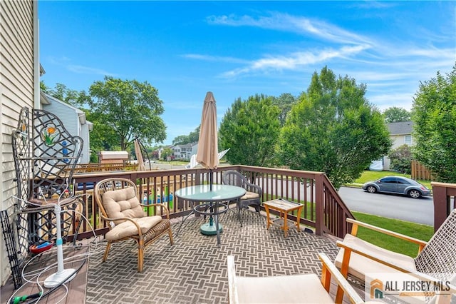 20 Karwatt Ct, Sayreville, NJ 08872 - wooden terrace with outdoor dining space