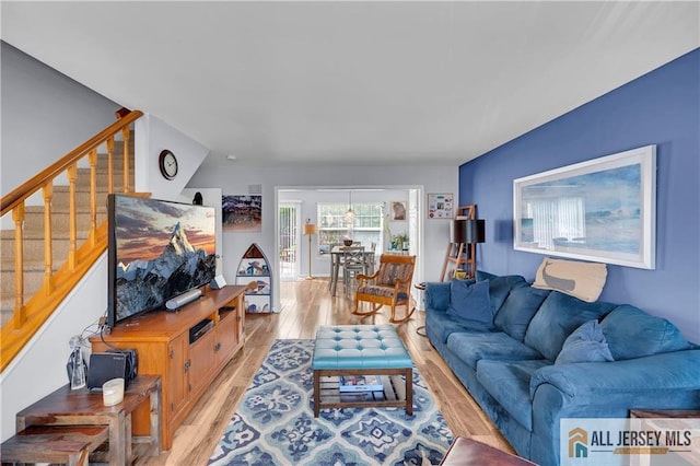 20 Karwatt Ct, Sayreville, NJ 08872 - living area with stairway and light wood-type flooring