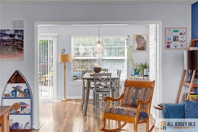 20 Karwatt Ct, Sayreville, NJ 08872 - dining space featuring wood finished floors and baseboards