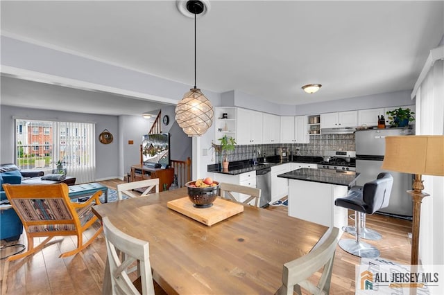 20 Karwatt Ct, Sayreville, NJ 08872 - dining room with light wood-style floors