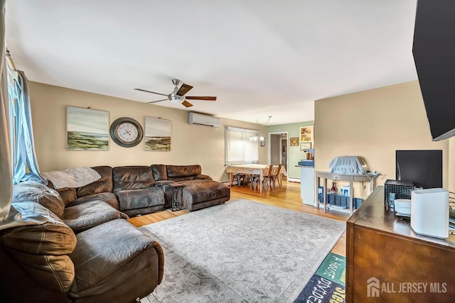 30 Falmouth Rd, Iselin, NJ 08830 - living area featuring wood finished floors, a wall mounted air conditioner, and ceiling fan