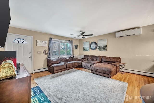 30 Falmouth Rd, Iselin, NJ 08830 - living room with ceiling fan, an AC wall unit, a baseboard heating unit, and wood finished floors