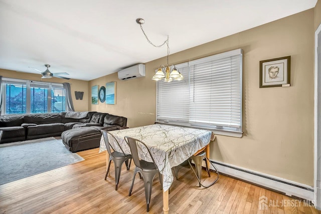 30 Falmouth Rd, Iselin, NJ 08830 - dining space featuring a wall mounted air conditioner, baseboard heating, light wood-style floors, ceiling fan, and a chandelier