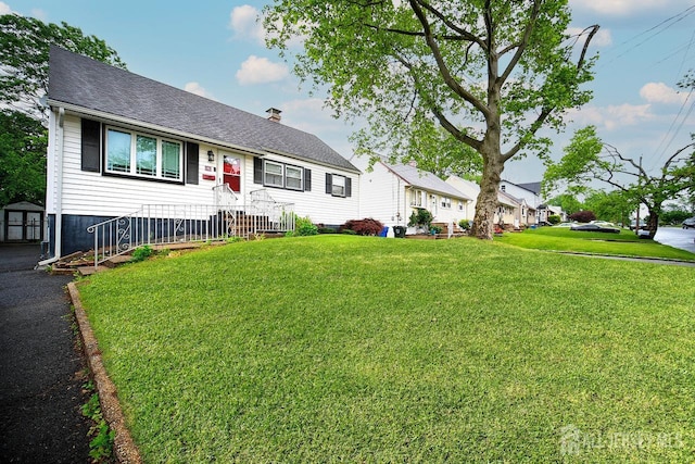 30 Falmouth Rd, Iselin, NJ 08830 - view of front of property featuring a front yard, a chimney, and a shingled roof