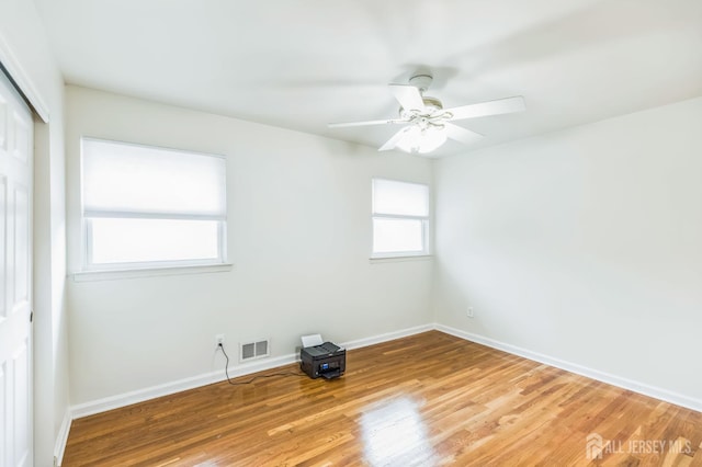 45 S Brook Dr, Milltown, NJ 08850 - unfurnished room featuring wood finished floors and ceiling fan