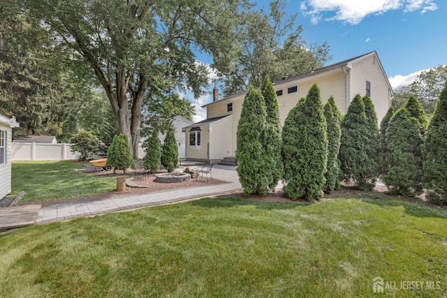 45 S Brook Dr, Milltown, NJ 08850 - view of yard featuring a fire pit and a patio