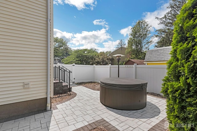 45 S Brook Dr, Milltown, NJ 08850 - view of patio / terrace featuring a hot tub