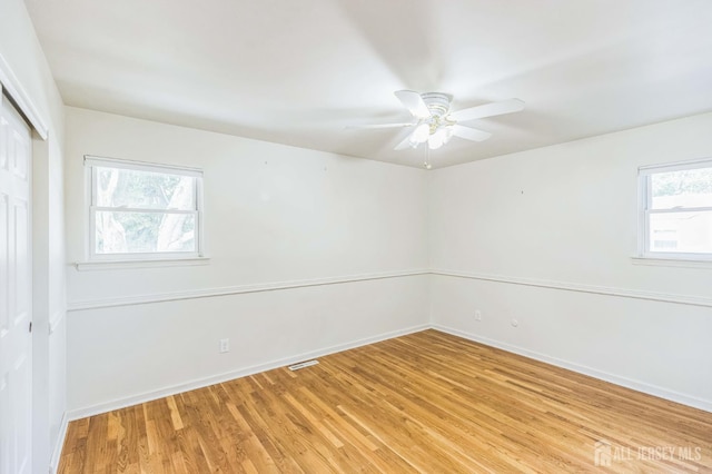 45 S Brook Dr, Milltown, NJ 08850 - unfurnished bedroom with a closet, light wood finished floors, and ceiling fan
