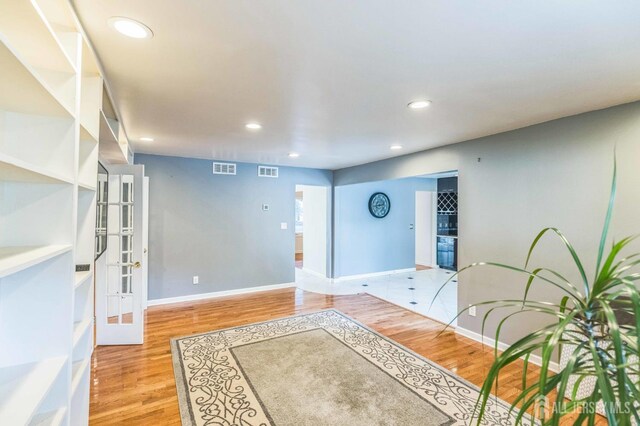 45 S Brook Dr, Milltown, NJ 08850 - entrance foyer with wood finished floors, recessed lighting, and french doors