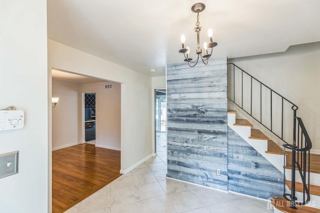 45 S Brook Dr, Milltown, NJ 08850 - stairway with a chandelier and baseboards