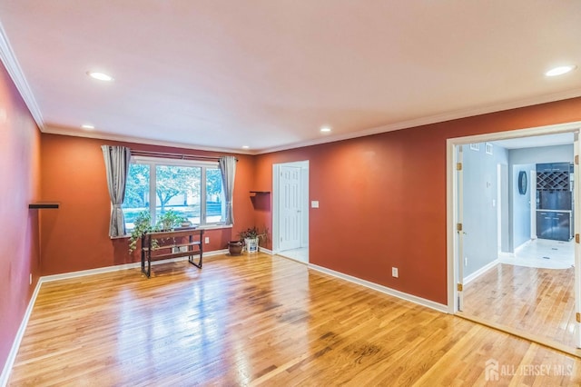 45 S Brook Dr, Milltown, NJ 08850 - unfurnished room featuring light wood-style floors, ornamental molding, and recessed lighting