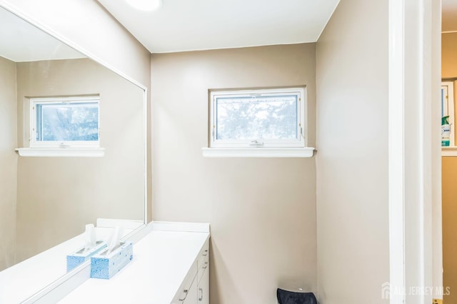 45 S Brook Dr, Milltown, NJ 08850 - bathroom with vanity and healthy amount of natural light