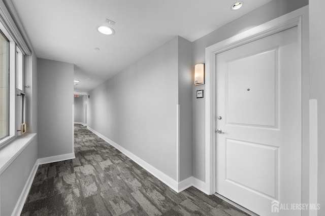 20 Livingston Ave Unit 905, New Brunswick, NJ 08901 - hall with dark carpet and recessed lighting