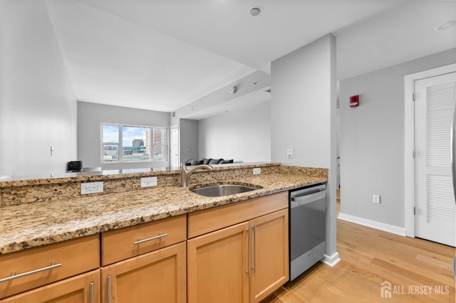 20 Livingston Ave Unit 905, New Brunswick, NJ 08901 - kitchen with dishwasher, light wood finished floors, light stone countertops, and open floor plan
