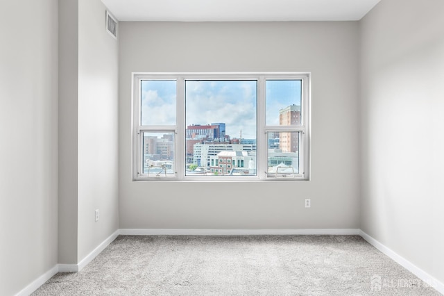 20 Livingston Ave Unit 905, New Brunswick, NJ 08901 - carpeted spare room with baseboards and a view of city