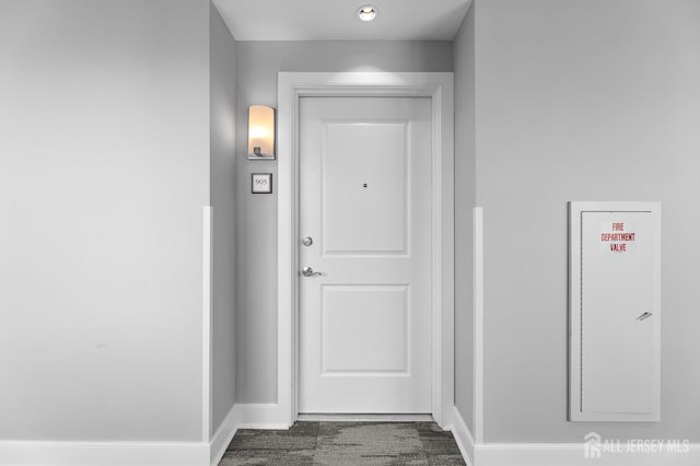 20 Livingston Ave Unit 905, New Brunswick, NJ 08901 - hallway featuring baseboards