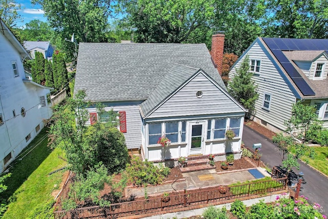 436 2nd St, Dunellen, NJ 08812 - view of front of home featuring a chimney and roof with shingles