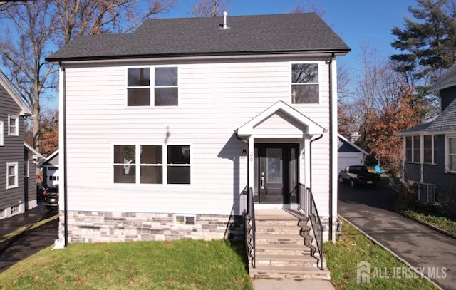 front facade featuring cooling unit