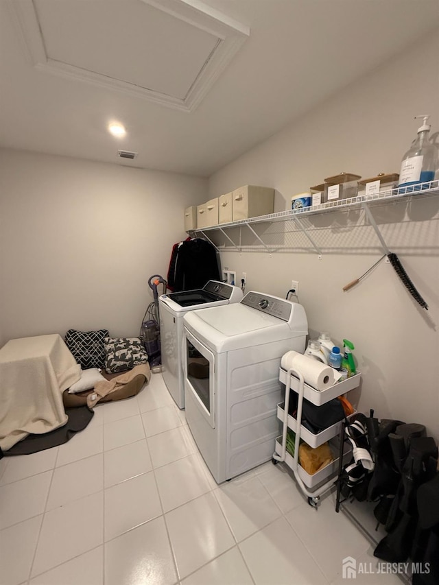 3504 Charleston Dr, Monroe, NJ 08831 - washroom with washer and clothes dryer and light tile patterned floors