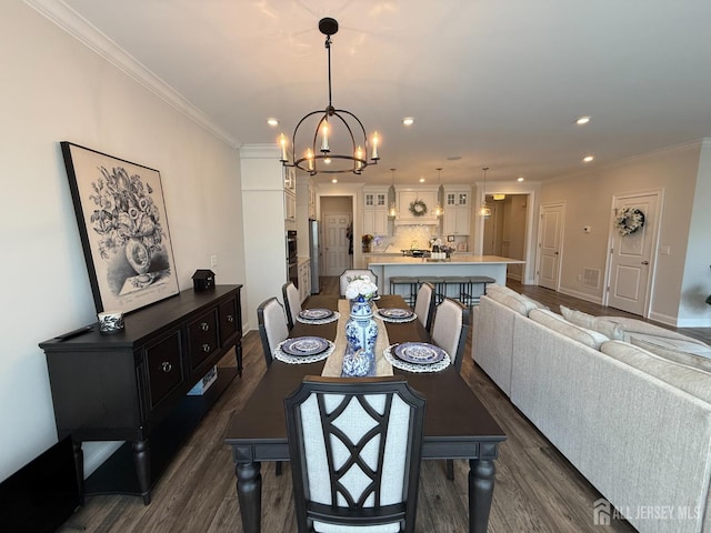 3504 Charleston Dr, Monroe, NJ 08831 - dining area featuring dark wood-type flooring, a chandelier, ornamental molding, recessed lighting, and baseboards