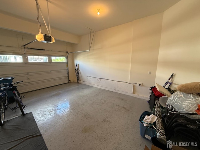 3504 Charleston Dr, Monroe, NJ 08831 - garage featuring a garage door opener