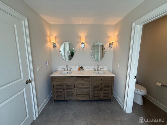 3504 Charleston Dr, Monroe, NJ 08831 - bathroom featuring double vanity, baseboards, toilet, and tile patterned floors