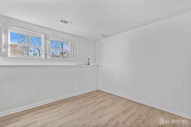 empty room featuring light hardwood / wood-style flooring