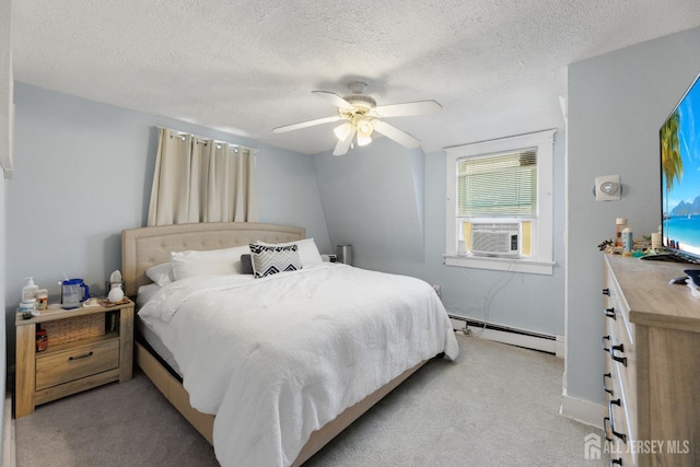 336 S Main St, Milltown, NJ 08850 - bedroom with a baseboard radiator, cooling unit, light colored carpet, ceiling fan, and a textured ceiling