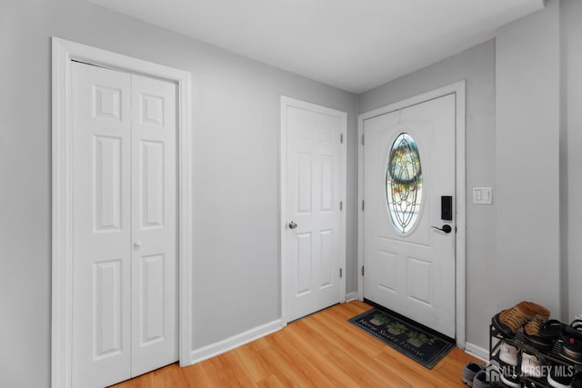 336 S Main St, Milltown, NJ 08850 - foyer entrance with light wood-type flooring and baseboards