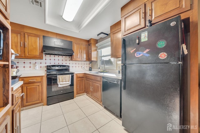 kitchen featuring sink, decorative backsplash, black appliances, light tile patterned floors, and crown molding