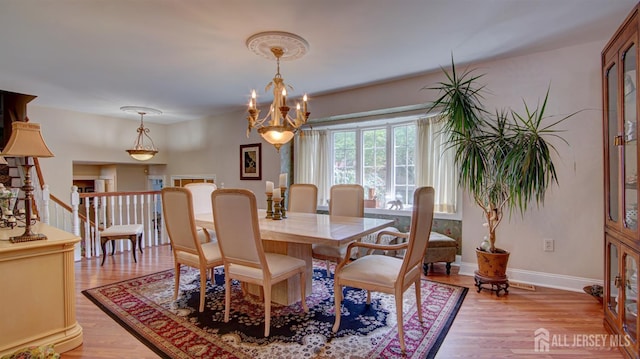 3 Feathertree Ct, Howell, NJ 07731 - dining room featuring light wood-style flooring and a chandelier