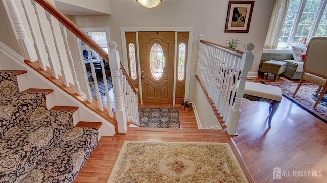 3 Feathertree Ct, Howell, NJ 07731 - foyer entrance with wood finished floors and stairs