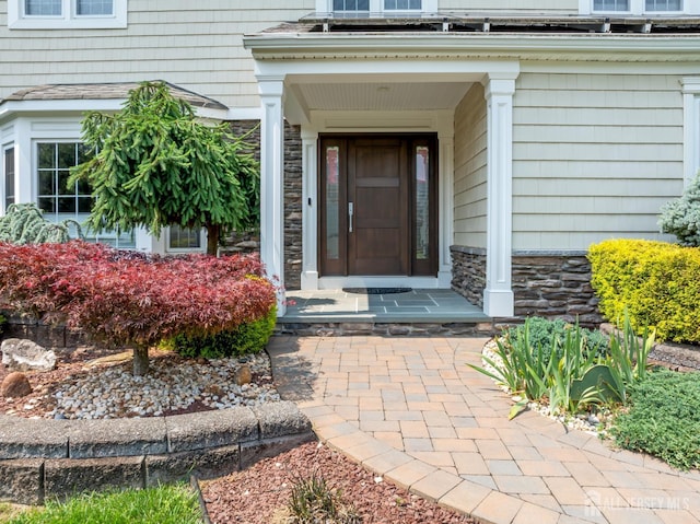 6 Schindler Ct, East Brunswick, NJ 08816 - doorway to property featuring stone siding