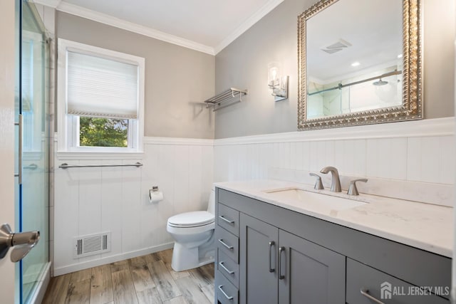 6 Schindler Ct, East Brunswick, NJ 08816 - bathroom featuring vanity, an enclosed shower, ornamental molding, wainscoting, and wood finished floors