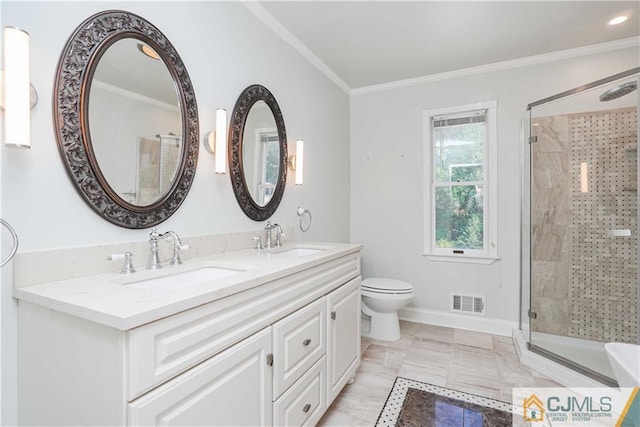 full bath with a stall shower, a sink, visible vents, and crown molding