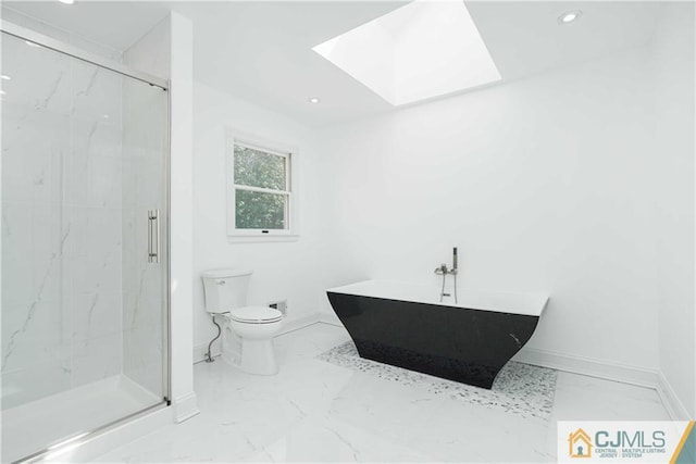 bathroom featuring a skylight, a marble finish shower, baseboards, toilet, and marble finish floor