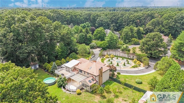 drone / aerial view with a forest view