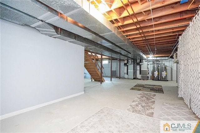 unfinished below grade area featuring heating unit, water heater, and stairway