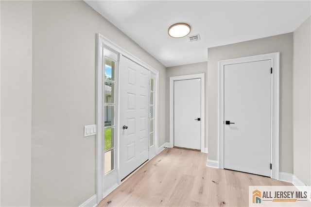 442 Dahlia Plz Unit 442A, Monroe, NJ 08831 - foyer featuring baseboards and light wood-type flooring