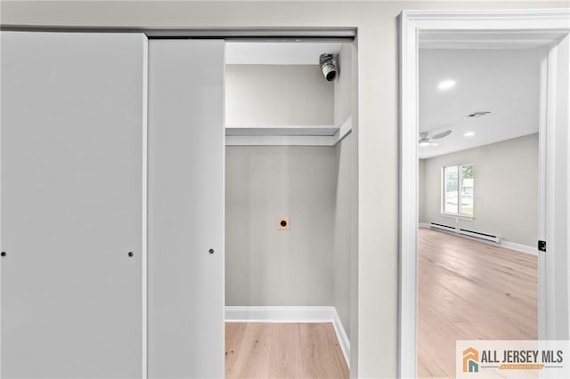 442 Dahlia Plz Unit 442A, Monroe, NJ 08831 - closet featuring baseboard heating