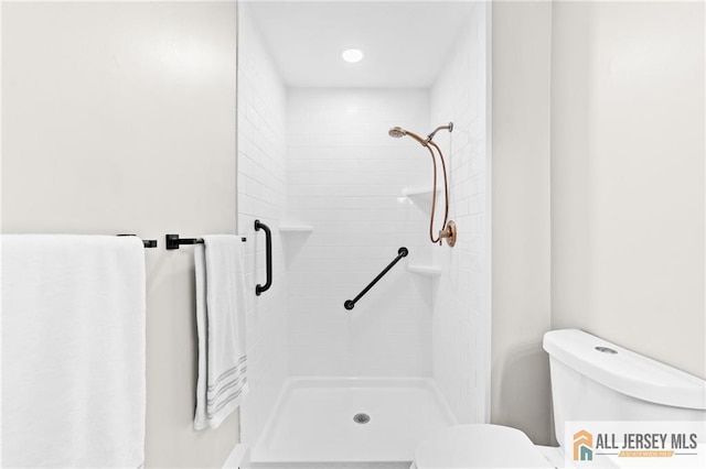 442 Dahlia Plz Unit 442A, Monroe, NJ 08831 - bathroom featuring a shower stall and toilet