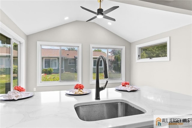442 Dahlia Plz Unit 442A, Monroe, NJ 08831 - kitchen featuring healthy amount of natural light, lofted ceiling, light stone counters, recessed lighting, and a ceiling fan