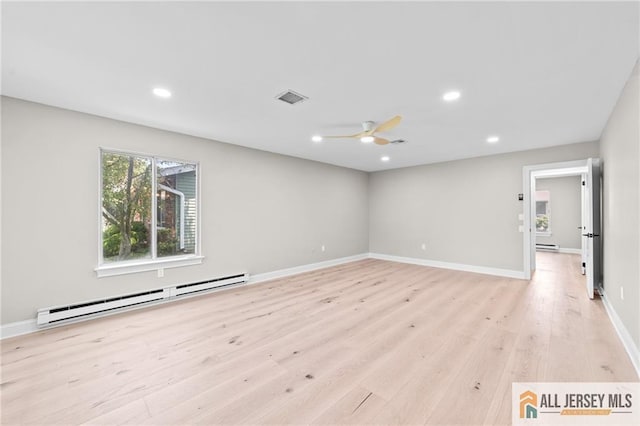 442 Dahlia Plz Unit 442A, Monroe, NJ 08831 - unfurnished room featuring baseboard heating, light wood-type flooring, a ceiling fan, and recessed lighting