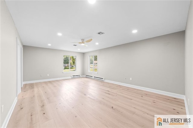 442 Dahlia Plz Unit 442A, Monroe, NJ 08831 - spare room with light wood-style flooring, baseboard heating, recessed lighting, and a ceiling fan