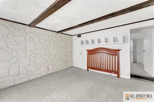 224 2nd St, South Amboy, NJ 08879 - unfurnished bedroom with beam ceiling and carpet
