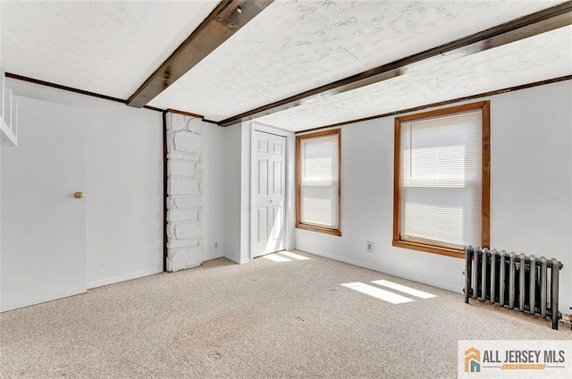 224 2nd St, South Amboy, NJ 08879 - carpeted spare room featuring radiator heating unit and baseboards