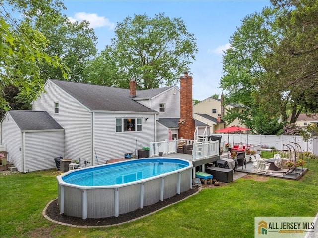 43 S Brook Dr, Milltown, NJ 08850 - view of pool with a wooden deck and a shed