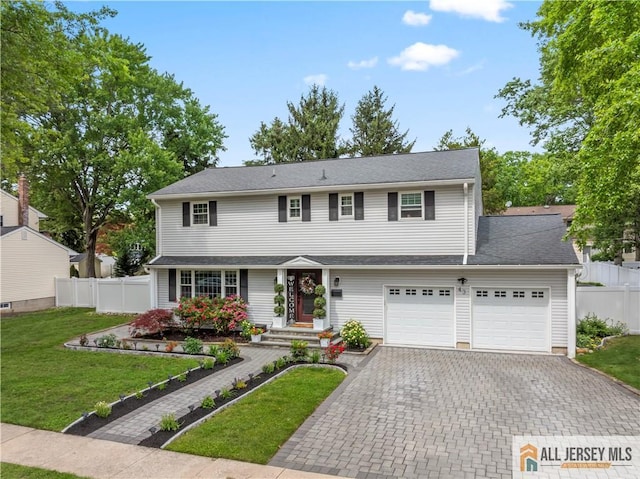 43 S Brook Dr, Milltown, NJ 08850 - view of front of home with decorative driveway and a garage