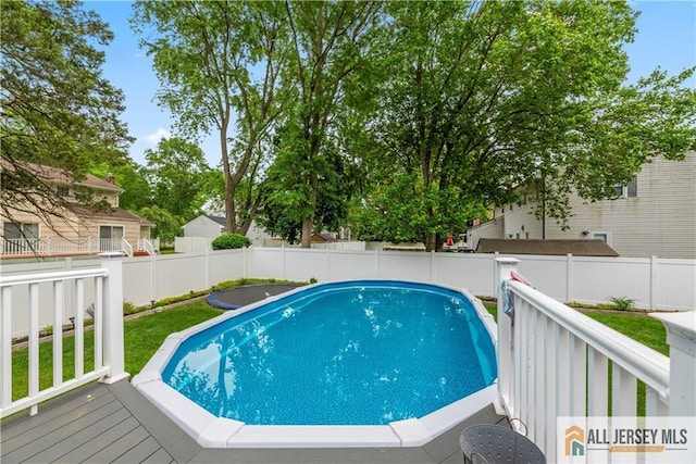 43 S Brook Dr, Milltown, NJ 08850 - view of swimming pool with a deck and a fenced backyard