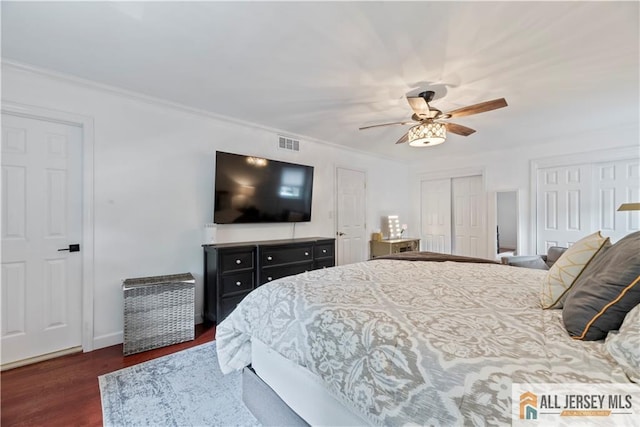 43 S Brook Dr, Milltown, NJ 08850 - bedroom with wood finished floors, multiple closets, a ceiling fan, and ornamental molding